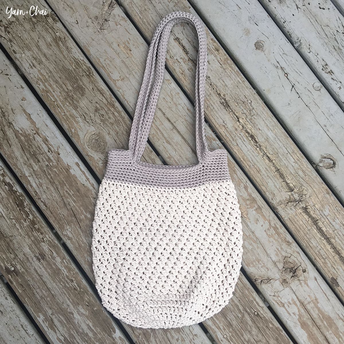 Cross-stitched Lamb Cinched Backpack